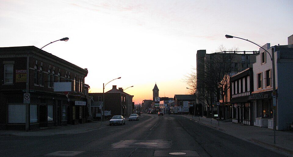 King Street West in downtown Dundas at golden hour, with the historic clock tower in the distance