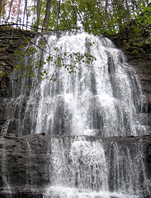 Sherman Falls, a tiered curtain waterfall in the Dundas Valley woods