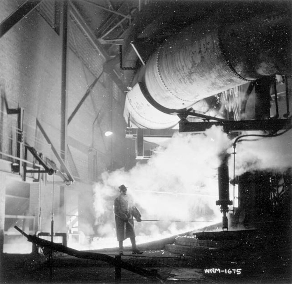 A steelworker at a Stelco open-hearth furnace, Hamilton